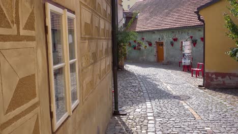 Establishing-shot-of-a-cobblestone-street-in-Cesk___´©-Krumlov-a-lovely-small-Bohemian-village-in-the-Czech-Republic