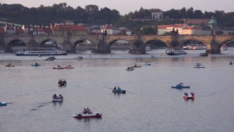Paddleboats-move-on-the-Vltava-River-in-Prague-Czech-Republic