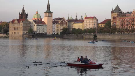 Paddleboats-move-on-the-Vltava-River-in-Prague-Czech-Republic-1