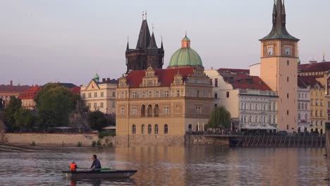 A-rowboat-moves-on-the-Vltava-River-in-Prague-Czech-Republic