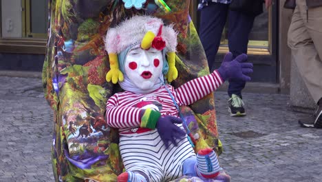 A-strange-street-performing-clown-acts-like-a-baby-1