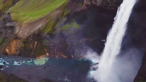 Antena-Sobre-La-Hermosa-Y-Sorprendente-Cascada-Alta-De-Haifoss-En-Islandia-3