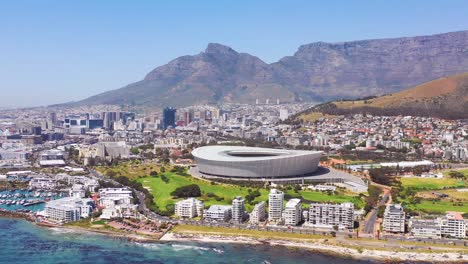 Good-aerial-establishing-shot-of-the-city-of-Cape-Town-South-Africa-with-Capetown-stadium-in-distance-1