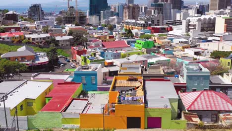 Aerial-over-colorful-Bo-kaap-Malay-quarter-Cape-Town-neighborhood-and-downtown-city-skyline-South-Africa-2