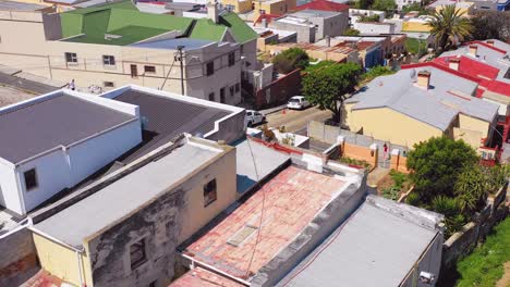 Aerial-over-colorful-Bo-kaap-Malay-quarter-Cape-Town-neighborhood-and-downtown-city-skyline-South-Africa-3
