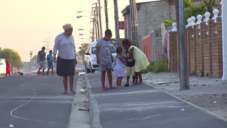 People-walk-on-the-streets-in-the-Gugulethu-township-in-South-Africa