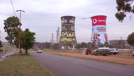 Establishing-shot-of-painted-cooling-towers-in-Soweto-township-South-Africa-1