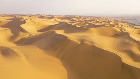 Astonishing-aerial-shot-over-the-vast-sand-dunes-of-the-Namib-Desert-along-the-Skeleton-Coast-of-Namibia-4