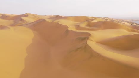 Good-aerial-shot-over-the-vast-sand-dunes-of-the-Namib-Desert-along-the-Skeleton-Coast-of-Namibia