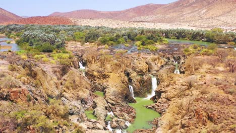 Una-Hermosa-Antena-Sobre-Epupa-Falls-En-La-Frontera-De-Angola-Y-Namibia-Africa-2