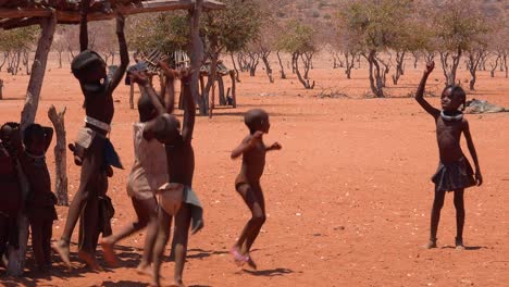 Poor-African-children-play-games-and-sports-with-a-ball-in-a-Himba-village-on-the-Namibia-Angola-border
