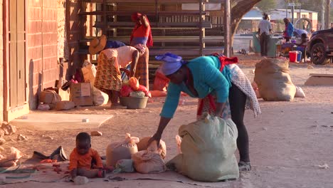Poor-African-citizens-shop-in-a-basic-Africa-street-market-in-Opuwo-Namibia-1