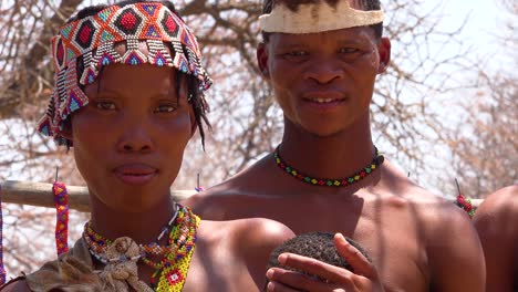 Beautiful-African-San-tribesmen-bushmen-family-portrait-with-baby-mother-and-father-parenthood