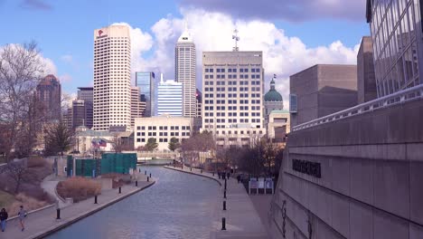 Establishing-shot-of-downtown-city-skyline-and-riverfront-walk-Indianapolis-Indiana-2