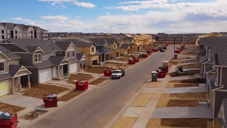 Good-aerial-over-a-neighborhood-of-homes-under-construction-in-the-suburbs-