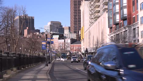 Traffic-moves-on-city-streets-through-downtown-Boston-Massachusetts