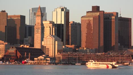 Skyline-of-downtown-Boston-Massachusetts-with-water-taxi-at-sunset-or-sunrise-2