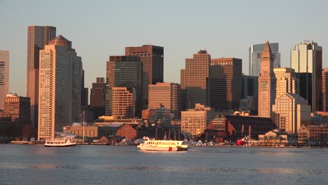 Skyline-of-downtown-Boston-Massachusetts-with-water-taxi-at-sunset-or-sunrise-3