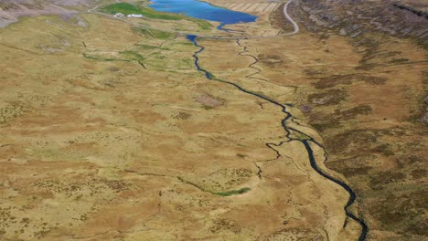 Nice-aerial-of-vast-landscapes-rivers-and-fjords-in-the-Westfjords-of-Iceland