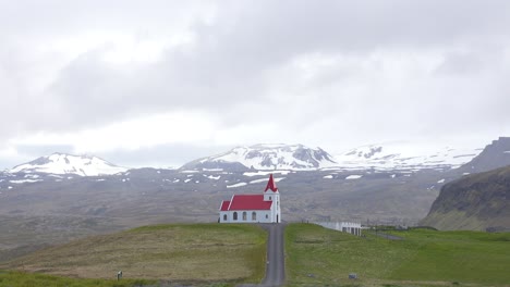 Time-lapse-shot-of-clouds-snow-and-rain-above-a-small-Icelandic-church-or-chapel-in-Iceland