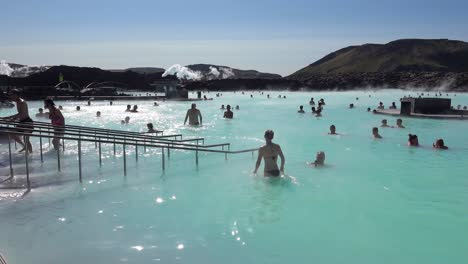 Establishing-of-bathers-enjoying-the-famous-Blue-Lagoon-geothermal-hot-water-spa-and-bath-in-Grindavik-Iceland