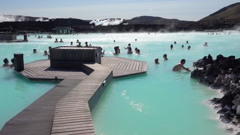 Establishing-of-bathers-enjoying-the-famous-Blue-Lagoon-geothermal-hot-water-spa-and-bath-in-Grindavik-Iceland-1