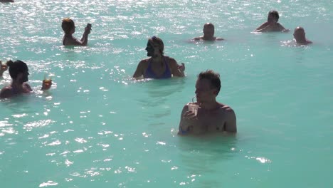 Establishing-of-bathers-enjoying-the-famous-Blue-Lagoon-geothermal-hot-water-spa-and-bath-in-Grindavik-Iceland-5