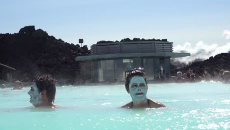 Establishing-of-bathers-with-mud-facials-in-the-famous-Blue-Lagoon-geothermal-hot-water-spa-and-bath-in-Grindavik-Iceland-2