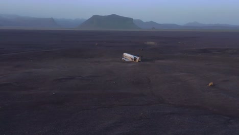 Aerial-over-a-crashed-US-Navy-DC-3-on-the-black-sands-of-Solheimasandur-Iceland-4
