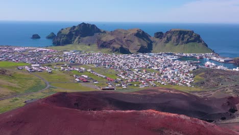 Good-aerial-of-Eldfell-volcano-looming-over-Heimaey-in-the-Westman-Islands-Vestmannaeyjar-Iceland--6