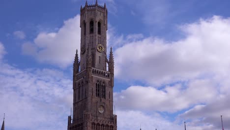 Time-lapse-clouds-moving-behind-the-Belfort-Van-Brugge-Bruges-belfry-bell-tower-in-Belgium
