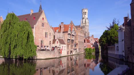 Beautiful-canal-and-the-Belfort-Van-Brugge-Bruges-belfry-bell-tower-in-Belgium-1