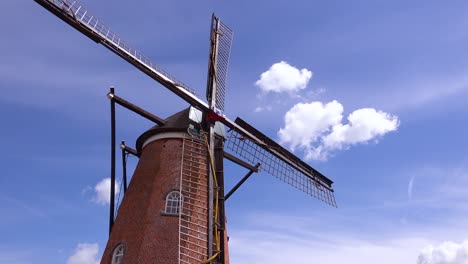 Nice-time-lapse-shot-of-a-Dutch-Holland-windmill-with-clouds-behind-1