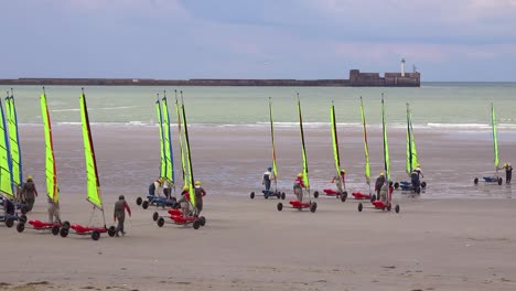Land-carts-or-sail-carts-or-blokarts-are-wheeled-onto-the-beach-in-France