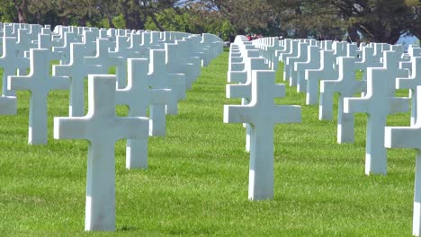 Graves-and-crosses-at-American-World-War-Two-cemetery-memorial-at-Omaha-Beach-Normandy-France