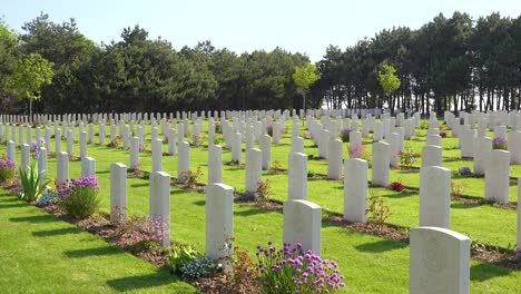 Graves-and-crosses-at-Calais-Canadian-World-War-Two-cemetery-memorial-near-Omaha-Beach-Normandy-France-2