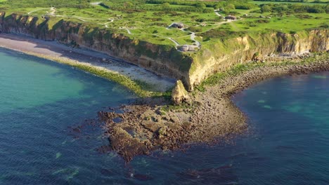 Aerial-over-Pointe-Du-Hoc-Normady-France-D-Day-site-pockmarked-with-bomb-craters-1