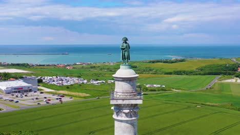 Aerial-around-Napoleon-Bonaparte-statue-in-Boulogne-sur-Mer-France-looking-across-English-Channel-towards-Great-Britain