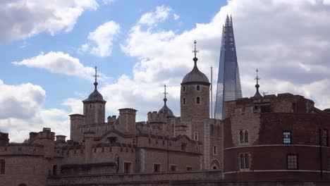 The-Shard-skyscraper-behind-the-Tower-of-London-a-contrast-of-architecture-London-England