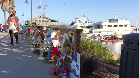 2019---people-pay-respects-at-a-memorial-for-the-Conception-dive-boat-fire-victims-in-Santa-Barbara-harbor-1