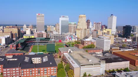 Good-aerial-over-the-downtown-business-district-of-Memphis-Tennessee-with-baseball-stadium-foreground