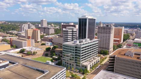 Good-aerial-establishing-shot-of-buildings-in-the-downtown-business-district-of-Jackson-Mississippi-with-state-capitol-distant