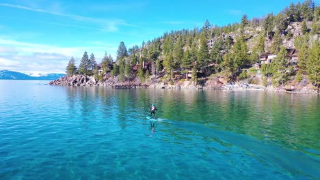 2020---a-man-rides-a-hydrofoil-efoil-electronic-surfboard-across-Lake-Tahoe-California-in-an-extreme-hydrofoiling-foil-sport-demonstration-3