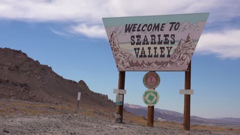2020---establishing-shot-welcome-sign-to-Searles-Valley-in-the-Mojave-Desert-near-Trona-California