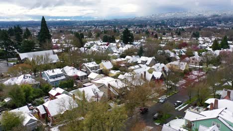 Aerial-over-snowy-winter-neighborhood-houses-suburbs-in-snow-in-Portland-Oregon