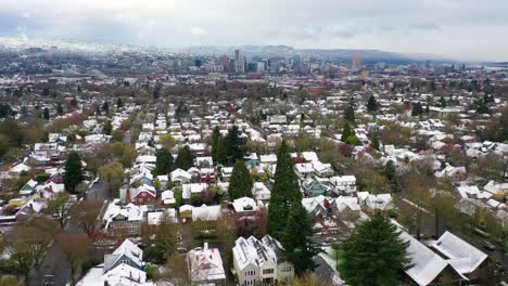 Aerial-over-snowy-winter-neighborhood-houses-suburbs-in-snow-in-Portland-Oregon-3