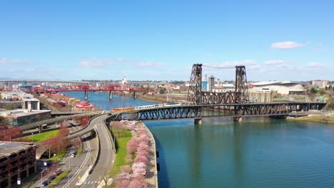 Aerial-over-steel-Bridge-Portland-Oregon-with-rapid-transit-over-Willamette-River