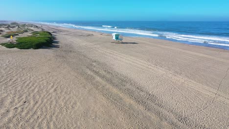 2020---aerial-of-closed-lifeguard-station-and-abandoned-beaches-of-Ventura-southern-california-during-covid-19-coronavirus-epidemic-as-people-stay-home-en-masse-3