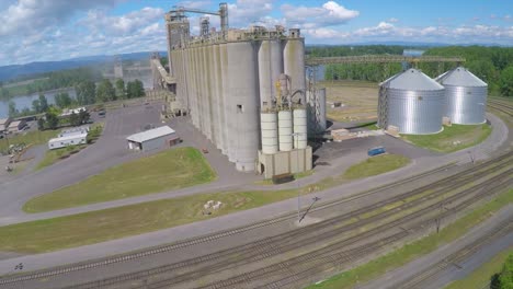 A-rising-aerial-shot-over-a-cement-plant-or-grain-refinery