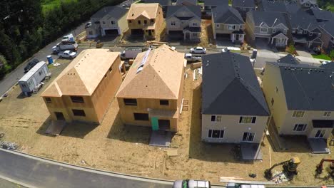 An-aerial-image-over-houses-under-construction-in-a-subdivision